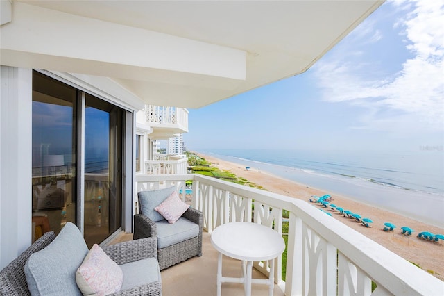 1051 Ocean Shore Blvd Unit 502, Ormond Beach, FL 32176 - balcony featuring view of water and beach