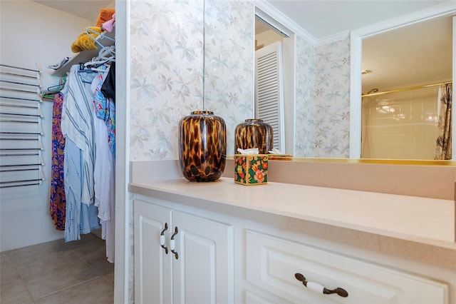 1051 Ocean Shore Blvd Unit 502, Ormond Beach, FL 32176 - full bath with wallpapered walls, tile patterned flooring, vanity, ornamental molding, and a shower