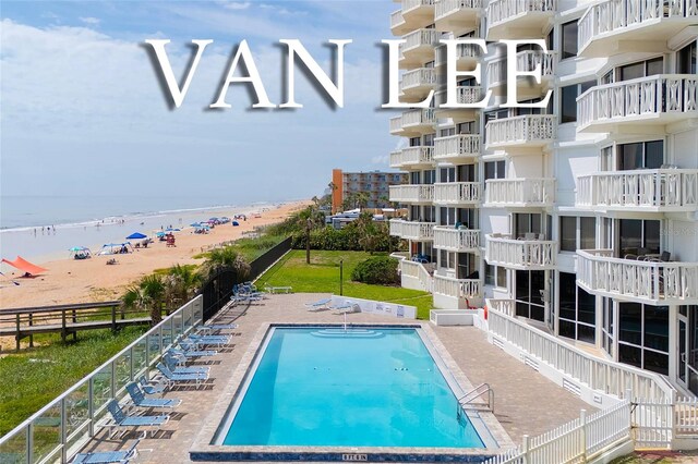 1051 Ocean Shore Blvd Unit 502, Ormond Beach, FL 32176 - community pool with view of water and beach