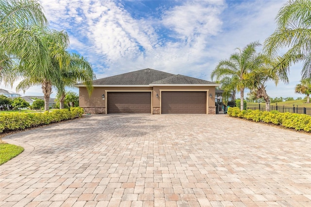 2939 Bella Flore Ter, New Smyrna Beach, FL 32168 - garage with decorative driveway