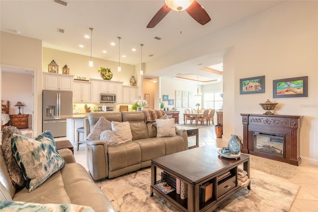 2939 Bella Flore Ter, New Smyrna Beach, FL 32168 - living room featuring light tile patterned floors, a ceiling fan, and recessed lighting