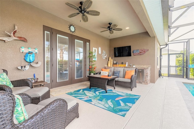 2939 Bella Flore Ter, New Smyrna Beach, FL 32168 - view of patio / terrace featuring french doors, an outdoor living space, ceiling fan, and a lanai
