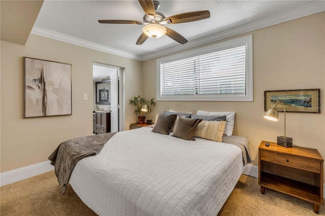 402 N Orange St, New Smyrna Beach, FL 32168 - bedroom featuring carpet, crown molding, connected bathroom, and a ceiling fan