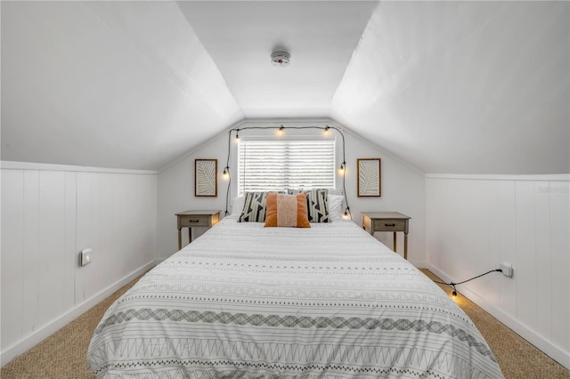 402 N Orange St, New Smyrna Beach, FL 32168 - bedroom featuring carpet flooring and lofted ceiling