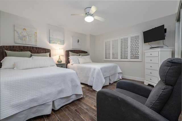 2555 S Atlantic Ave Unit 302, Daytona Beach Shores, FL 32118 - bedroom featuring wood tiled floors and ceiling fan