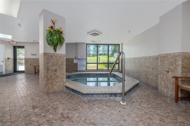2555 S Atlantic Ave Unit 302, Daytona Beach Shores, FL 32118 - view of swimming pool featuring an in-ground hot tub