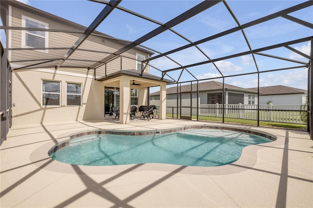 3116 Crab Trap Dr, New Smyrna Beach, FL 32168 - view of swimming pool featuring a patio area, a lanai, and a ceiling fan