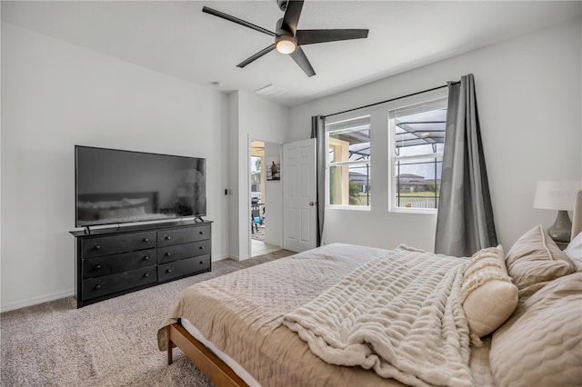 3116 Crab Trap Dr, New Smyrna Beach, FL 32168 - carpeted bedroom with baseboards and ceiling fan
