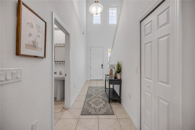 3116 Crab Trap Dr, New Smyrna Beach, FL 32168 - foyer entrance with light tile patterned floors and a high ceiling