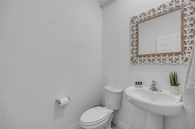 3116 Crab Trap Dr, New Smyrna Beach, FL 32168 - half bathroom with toilet and baseboards