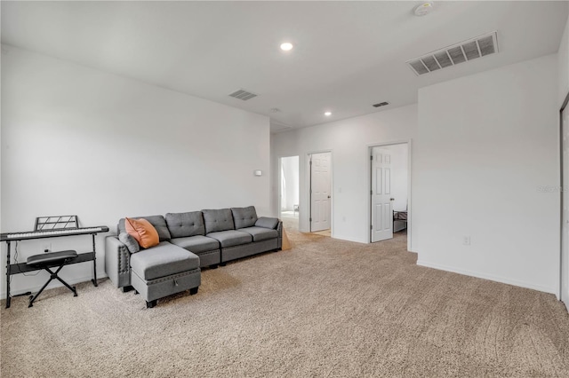 3116 Crab Trap Dr, New Smyrna Beach, FL 32168 - carpeted living room with recessed lighting and baseboards
