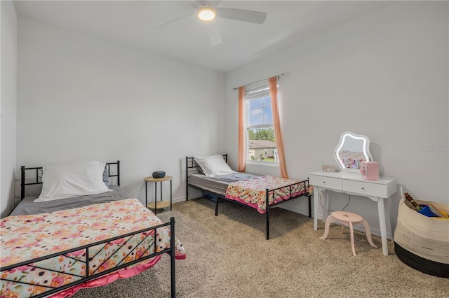 3116 Crab Trap Dr, New Smyrna Beach, FL 32168 - carpeted bedroom with a ceiling fan and baseboards