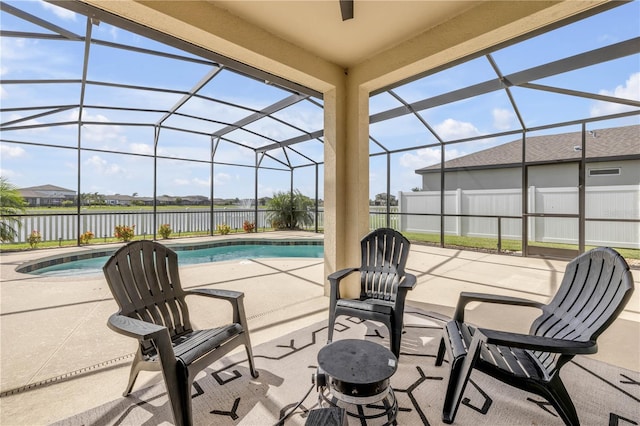 3116 Crab Trap Dr, New Smyrna Beach, FL 32168 - view of patio featuring a water view and glass enclosure