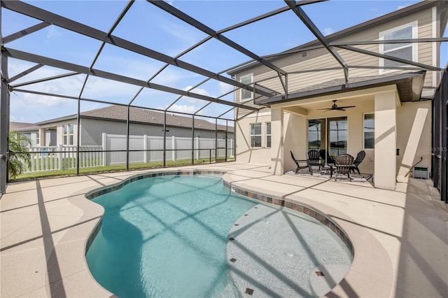 3116 Crab Trap Dr, New Smyrna Beach, FL 32168 - swimming pool with a patio area, ceiling fan, and a lanai