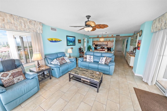 2967 S Atlantic Ave Unit 508, Daytona Beach, FL 32118 - living room with ceiling fan and light tile patterned floors