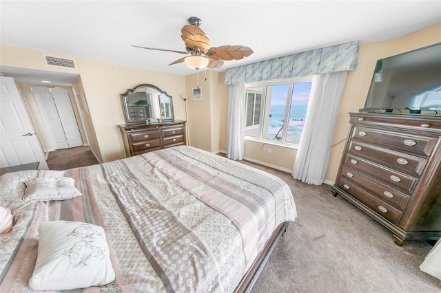 2967 S Atlantic Ave Unit 508, Daytona Beach, FL 32118 - carpeted bedroom featuring baseboards and ceiling fan