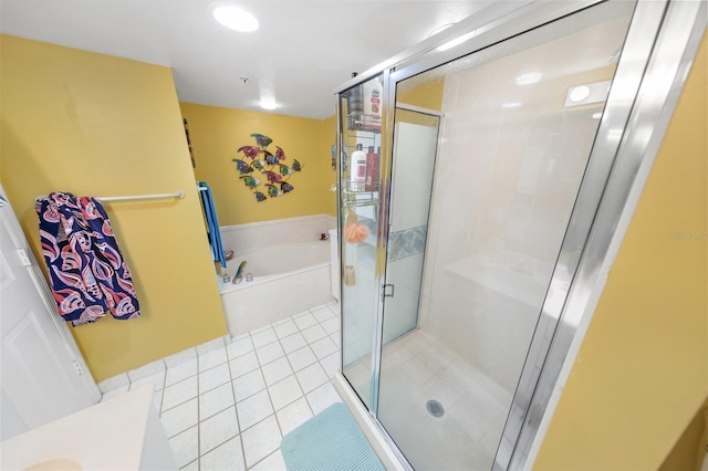 2967 S Atlantic Ave Unit 508, Daytona Beach, FL 32118 - full bath featuring a bath, tile patterned flooring, a shower stall, and vanity