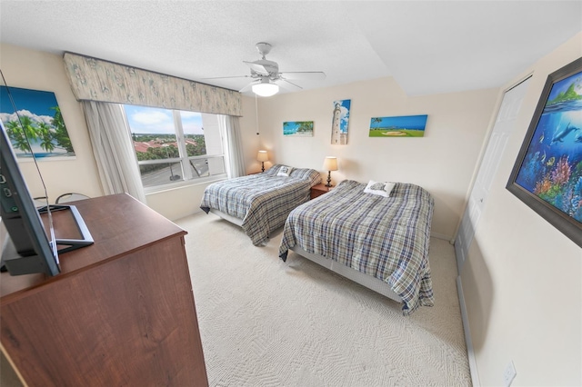 2967 S Atlantic Ave Unit 508, Daytona Beach, FL 32118 - carpeted bedroom featuring ceiling fan