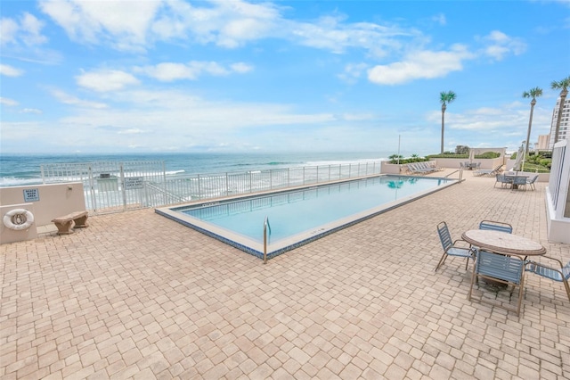 2967 S Atlantic Ave Unit 508, Daytona Beach, FL 32118 - community pool with a patio area and a water view