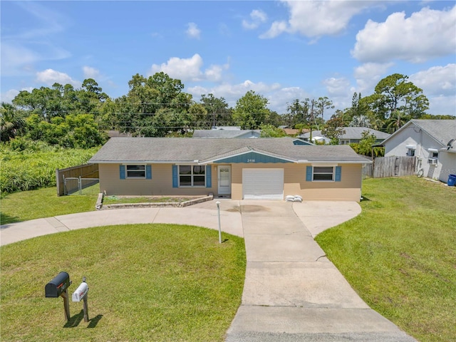 2416 Pine Tree Dr, Edgewater, FL 32141 - ranch-style home featuring driveway and an attached garage