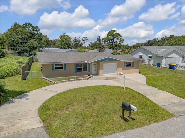 2416 Pine Tree Dr, Edgewater, FL 32141 - ranch-style house featuring an attached garage and concrete driveway