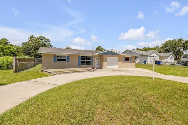 2416 Pine Tree Dr, Edgewater, FL 32141 - ranch-style home with a garage and driveway