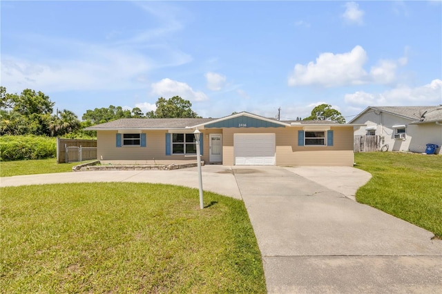 2416 Pine Tree Dr, Edgewater, FL 32141 - ranch-style house featuring driveway and an attached garage