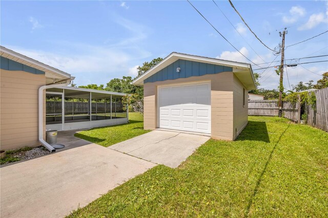 2416 Pine Tree Dr, Edgewater, FL 32141 - detached garage featuring driveway
