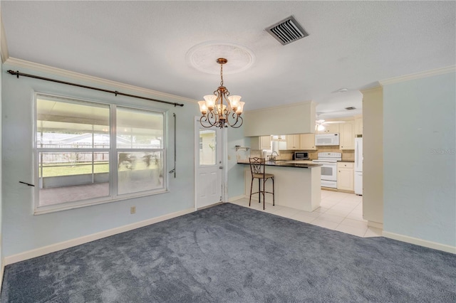 2416 Pine Tree Dr, Edgewater, FL 32141 - interior space with a chandelier, ornamental molding, light colored carpet, and light tile patterned flooring