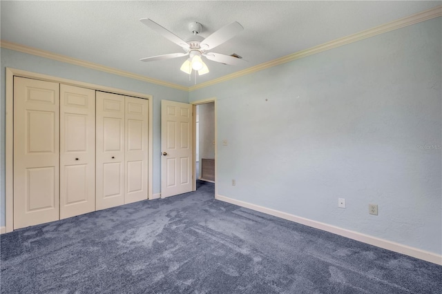 2416 Pine Tree Dr, Edgewater, FL 32141 - unfurnished bedroom with carpet, crown molding, a closet, and a ceiling fan