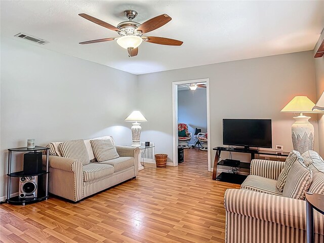 1331 Needle Palm Dr, Edgewater, FL 32132 - living area featuring ceiling fan and light wood-style floors