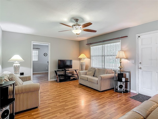 1331 Needle Palm Dr, Edgewater, FL 32132 - living room with ceiling fan, healthy amount of natural light, and light wood-style floors