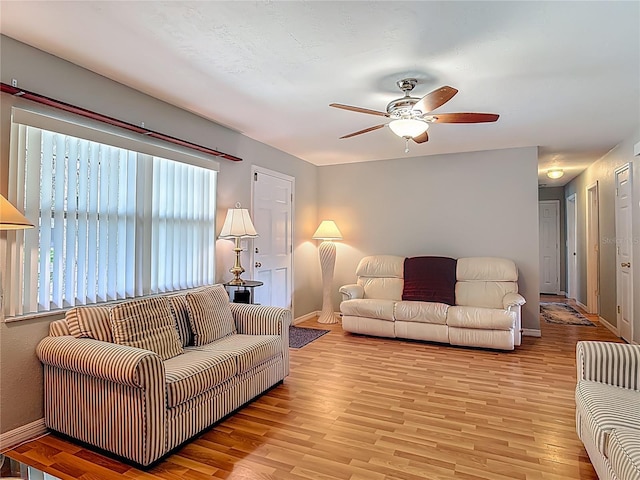 1331 Needle Palm Dr, Edgewater, FL 32132 - living area with a ceiling fan and light wood-type flooring
