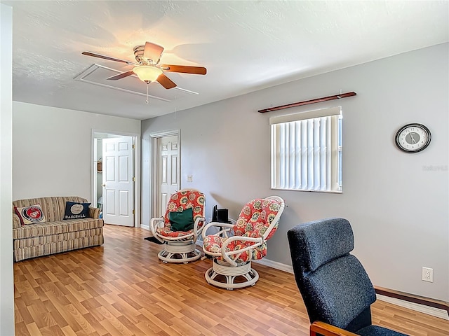 1331 Needle Palm Dr, Edgewater, FL 32132 - sitting room featuring light wood-style flooring and ceiling fan