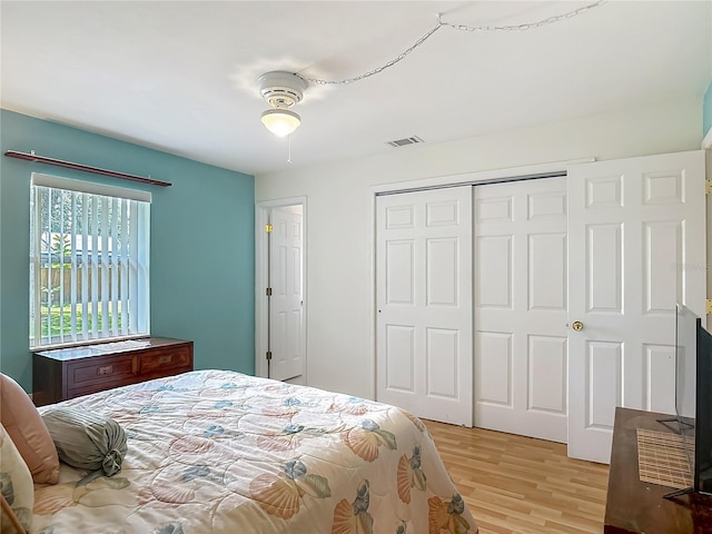 1331 Needle Palm Dr, Edgewater, FL 32132 - bedroom featuring light wood-type flooring and a closet