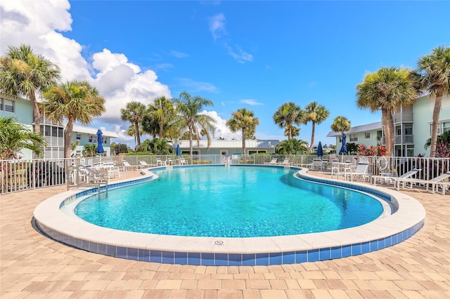 325 N Causeway Unit B305, New Smyrna Beach, FL 32169 - community pool featuring a patio area