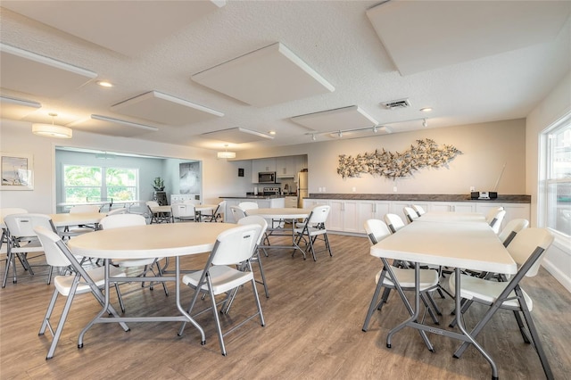 325 N Causeway Unit B305, New Smyrna Beach, FL 32169 - dining area featuring light wood finished floors and recessed lighting