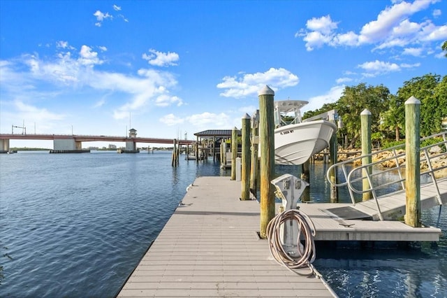 206 Canova Dr, New Smyrna Beach, FL 32169 - dock area featuring boat lift and a water view