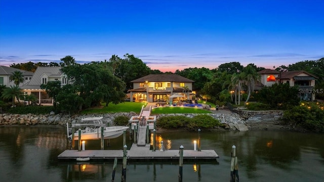 206 Canova Dr, New Smyrna Beach, FL 32169 - dock featuring a water view and boat lift