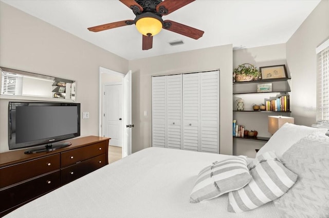 206 Canova Dr, New Smyrna Beach, FL 32169 - bedroom featuring a closet and ceiling fan