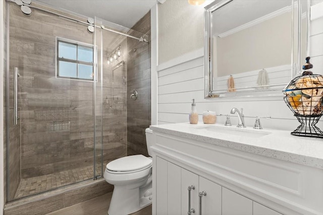 206 Canova Dr, New Smyrna Beach, FL 32169 - full bath with vanity, a stall shower, ornamental molding, and wood finished floors