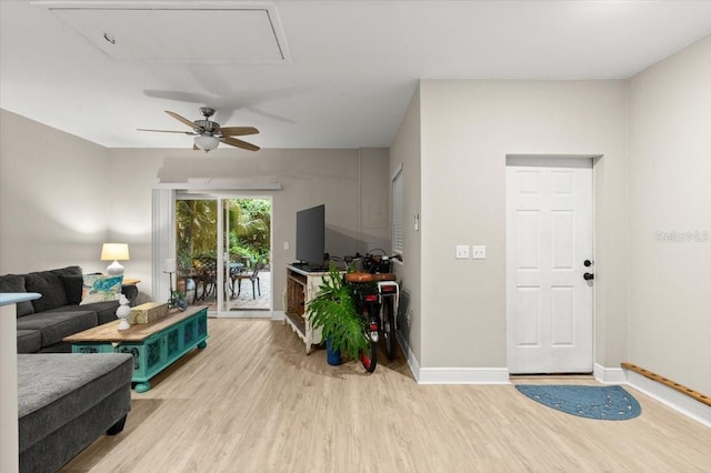 206 Canova Dr, New Smyrna Beach, FL 32169 - living room featuring wood finished floors and a ceiling fan