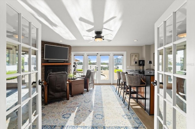 206 Canova Dr, New Smyrna Beach, FL 32169 - office space featuring french doors, ceiling fan, recessed lighting, and wood finished floors