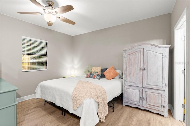 206 Canova Dr, New Smyrna Beach, FL 32169 - bedroom featuring light wood finished floors and a ceiling fan