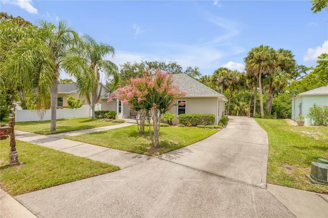 527 Old Minorcan Trl, New Smyrna Beach, FL 32168 - view of front of house with stucco siding and roof with shingles
