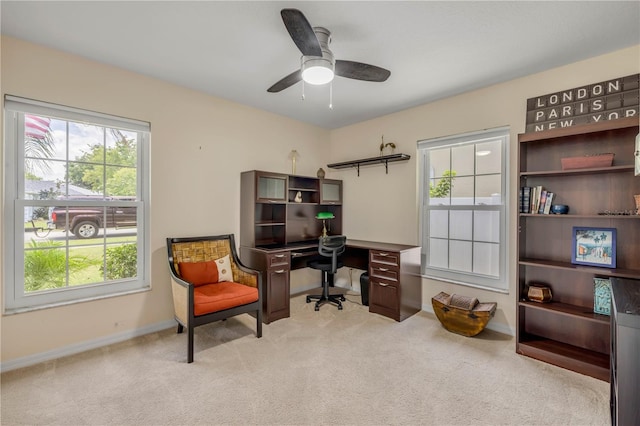 527 Old Minorcan Trl, New Smyrna Beach, FL 32168 - carpeted home office with baseboards and a ceiling fan