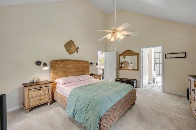 527 Old Minorcan Trl, New Smyrna Beach, FL 32168 - bedroom with light colored carpet, high vaulted ceiling, a ceiling fan, and ensuite bathroom