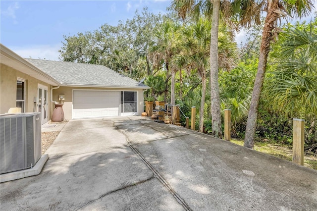 527 Old Minorcan Trl, New Smyrna Beach, FL 32168 - garage featuring driveway