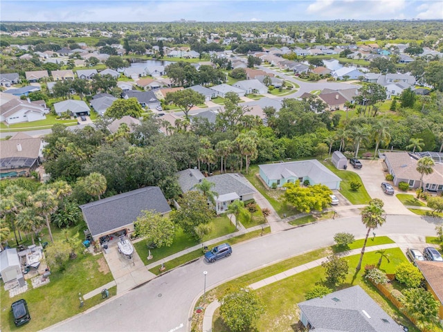 527 Old Minorcan Trl, New Smyrna Beach, FL 32168 - aerial overview of property's location with nearby suburban area and a nearby body of water