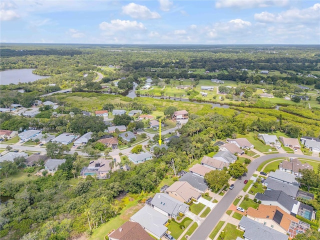 527 Old Minorcan Trl, New Smyrna Beach, FL 32168 - aerial view of property and surrounding area featuring a large body of water and nearby suburban area